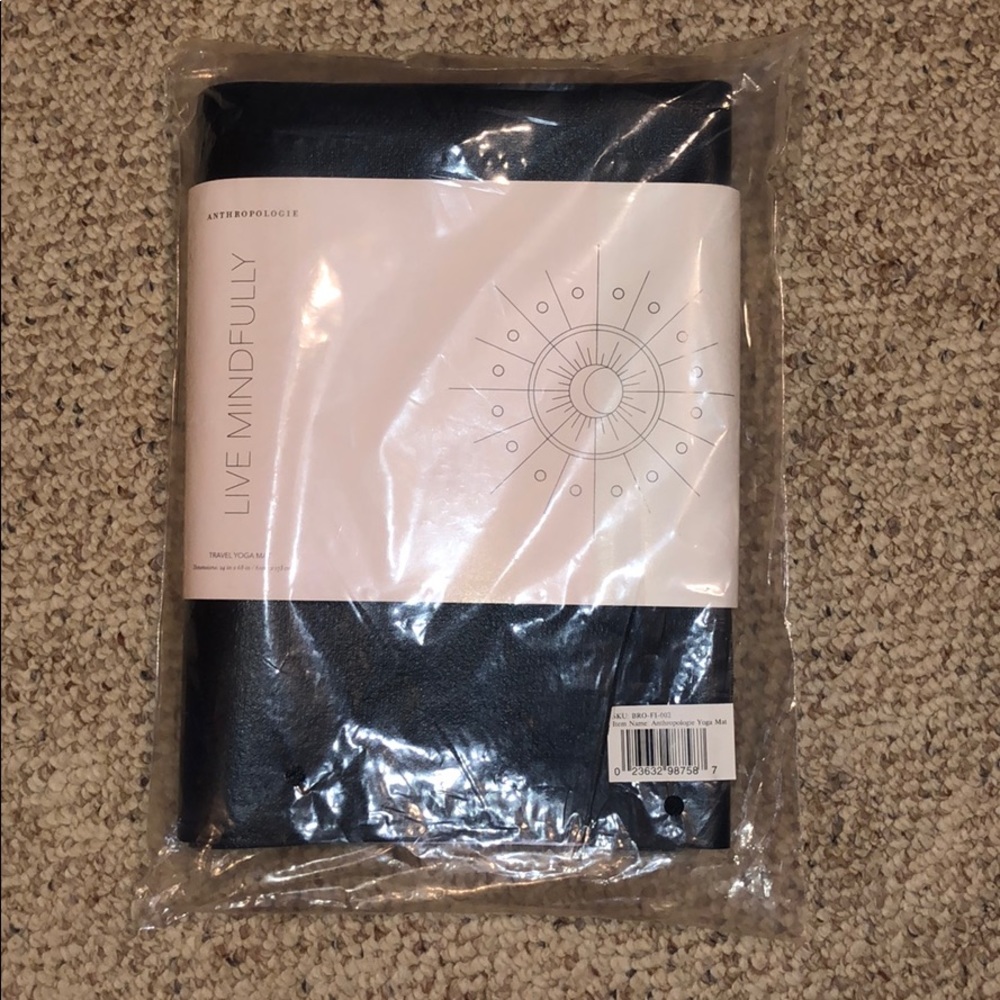 Anthropologie Travel Yoga Mat, never opened.